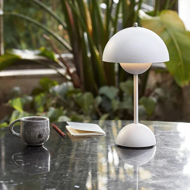 Dimmable LED table lamp with elegant MoonGlow design, perfect for modern home decor & accent lighting.