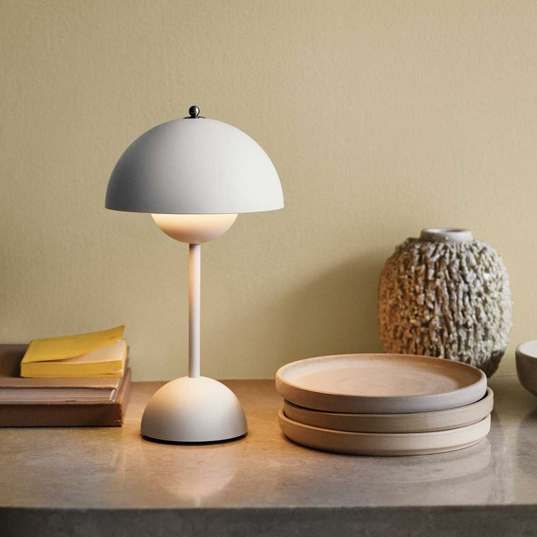 Elegant MoonGlow design LED table lamp, dimmable functionality for personalized lighting moods.