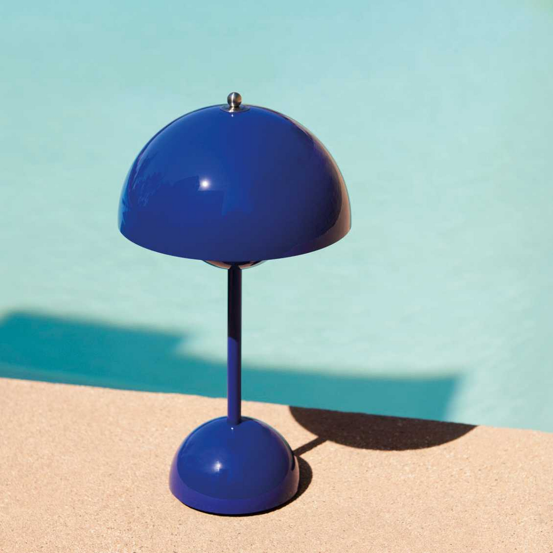 Modern dimmable LED table lamp with MoonGlow, casting a beautiful, adjustable glow for any room.