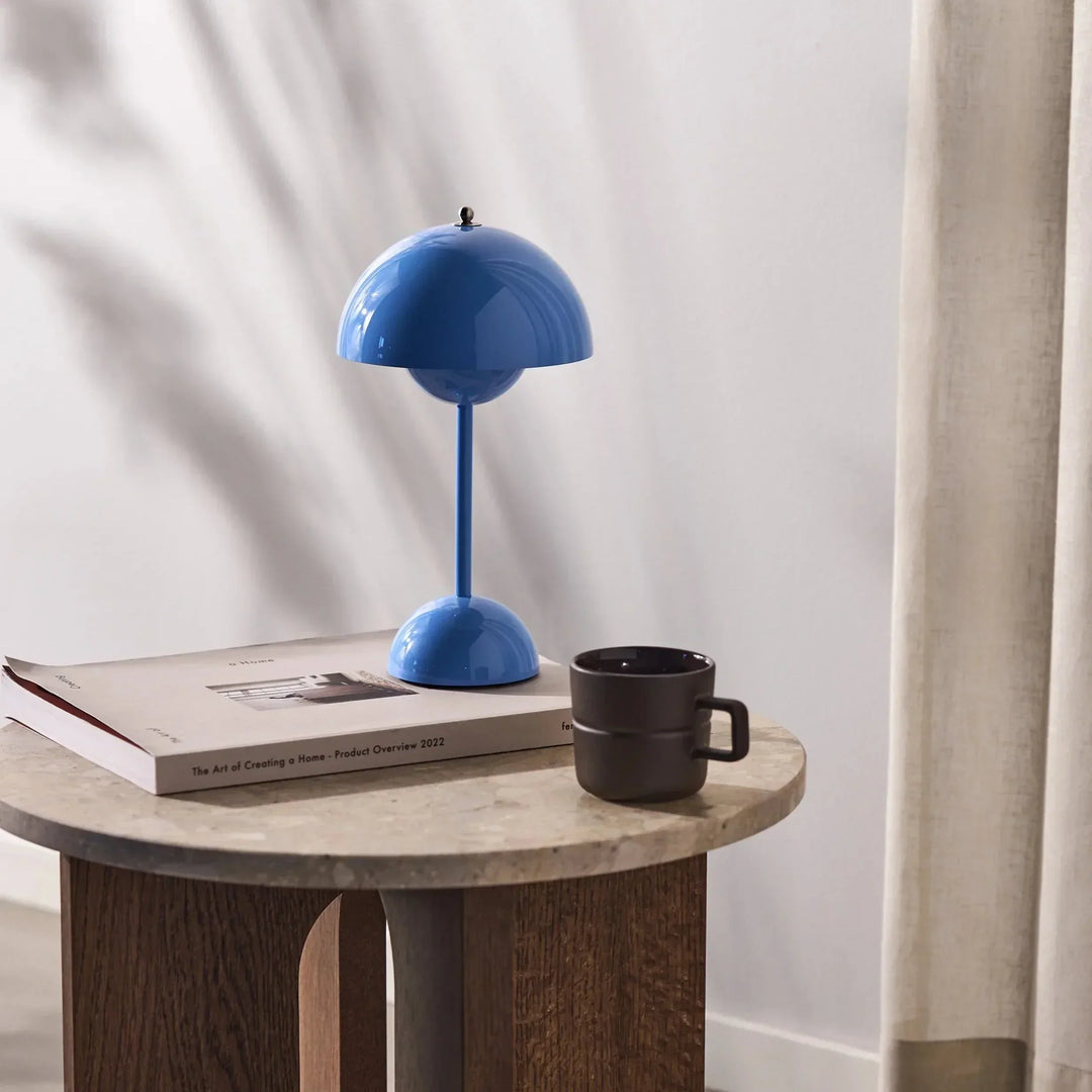 Accent lighting MoonGlow LED table lamp, dimmable, enhancing contemporary home interior design.