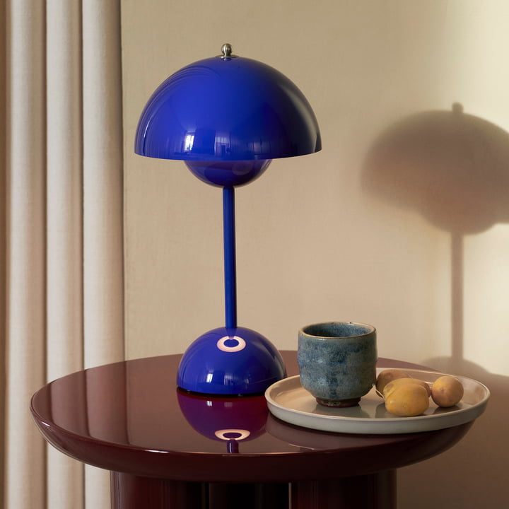 Sleek MoonGlow LED lamp, dimmable functionality, a perfect blend of style and practicality for home.