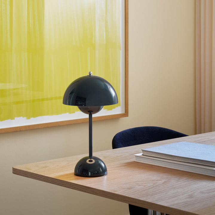 Adjustable brightness LED table lamp, MoonGlow design, ideal for various tasks and moods.