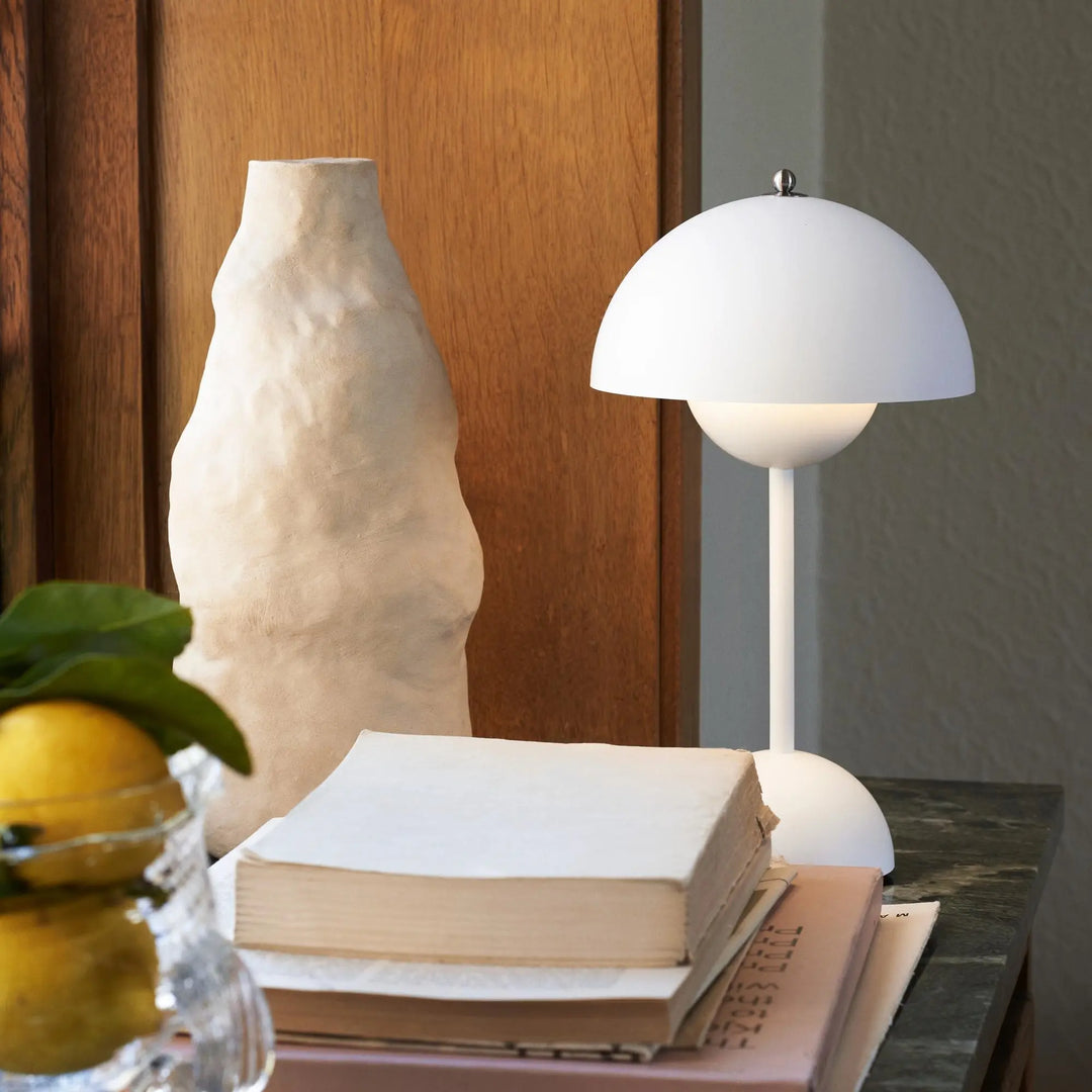 Rechargeable dimmable LED lamp, MoonGlow design, great for creating cozy accent lighting in any room.