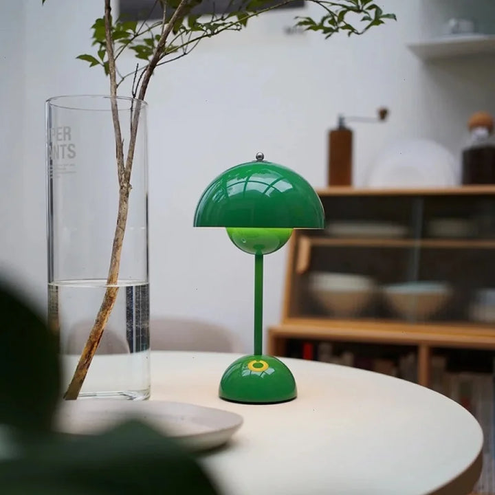 Decorative dimmable LED table lamp with MoonGlow, enhances home decor with soft, adjustable light.