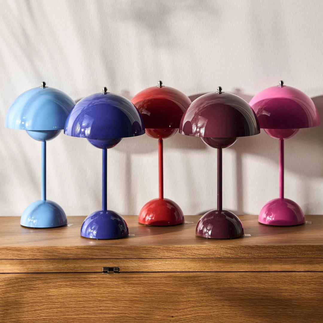 Compact wireless dimmable LED lamp, MoonGlow design, perfect for bedside tables or accent spaces.