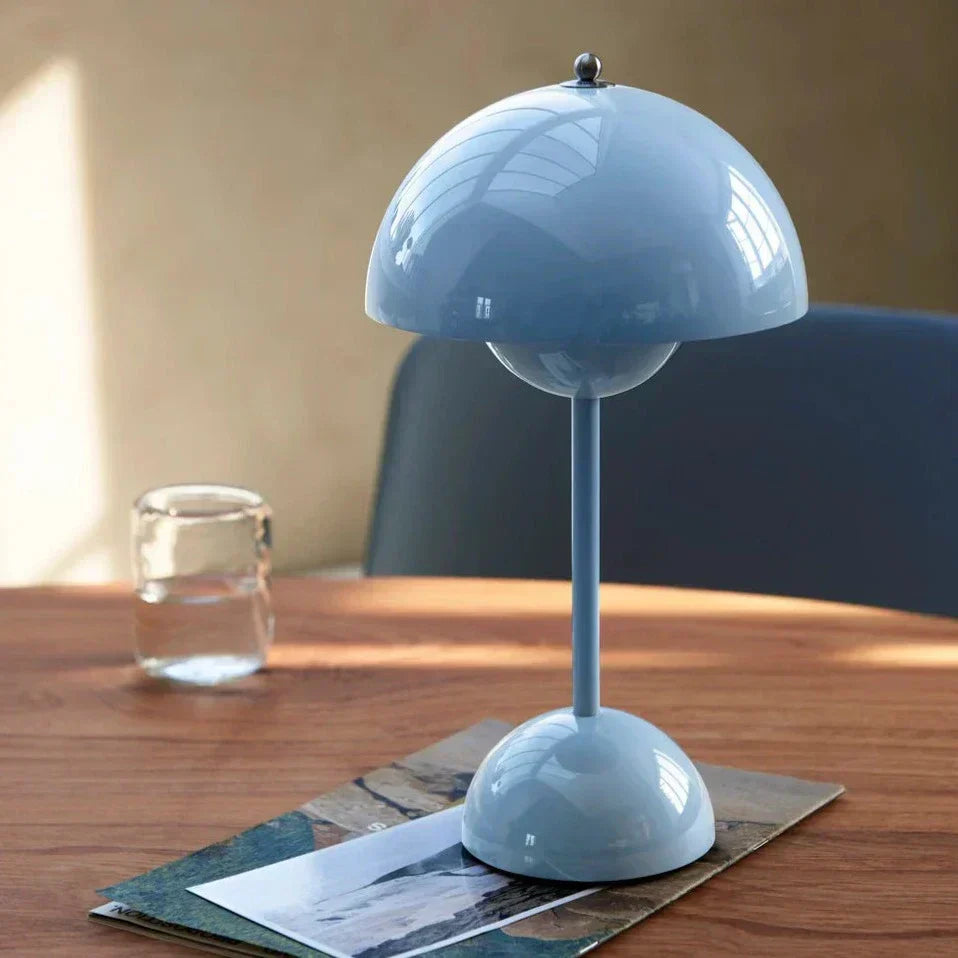Contemporary MoonGlow LED table lamp with touch dimming, enhancing any modern interior design.
