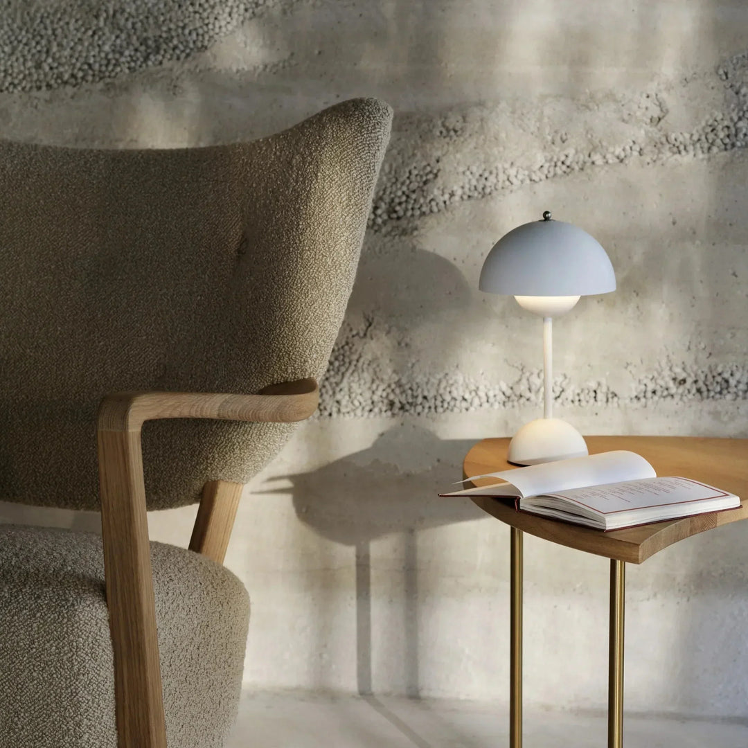 Energy-efficient dimmable LED lamp, unique MoonGlow aesthetic, provides soft, adjustable mood lighting.
