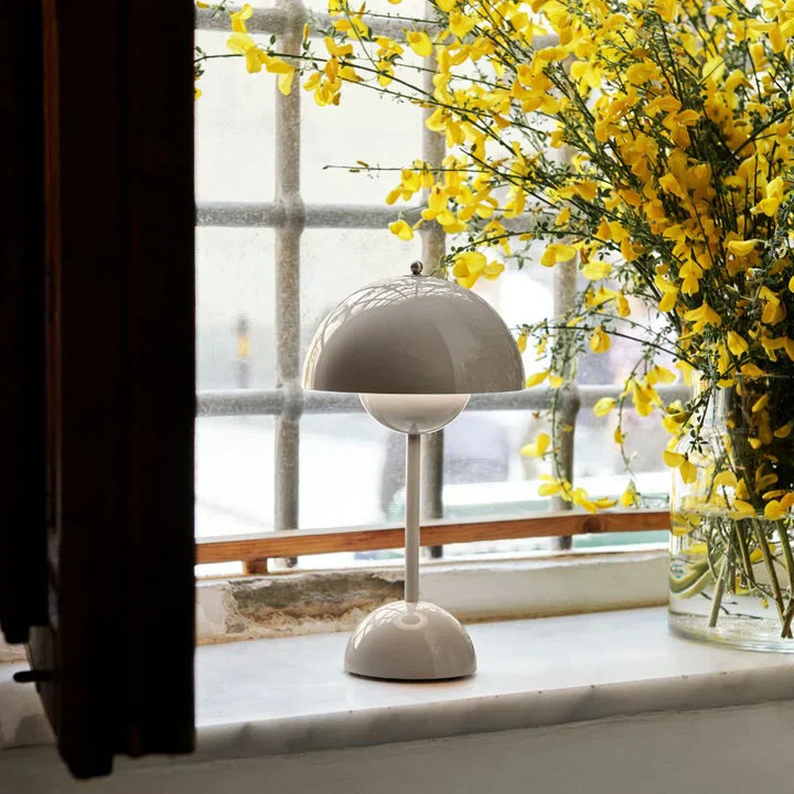 Portable wireless dimmable LED lamp, MoonGlow design, ideal for flexible home decor & ambiance.