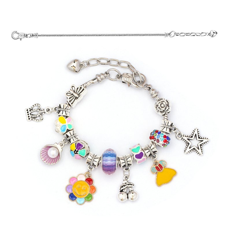 SparkleBands jewelry kit for kids, showcasing a variety of beads, thread, and gift packaging options