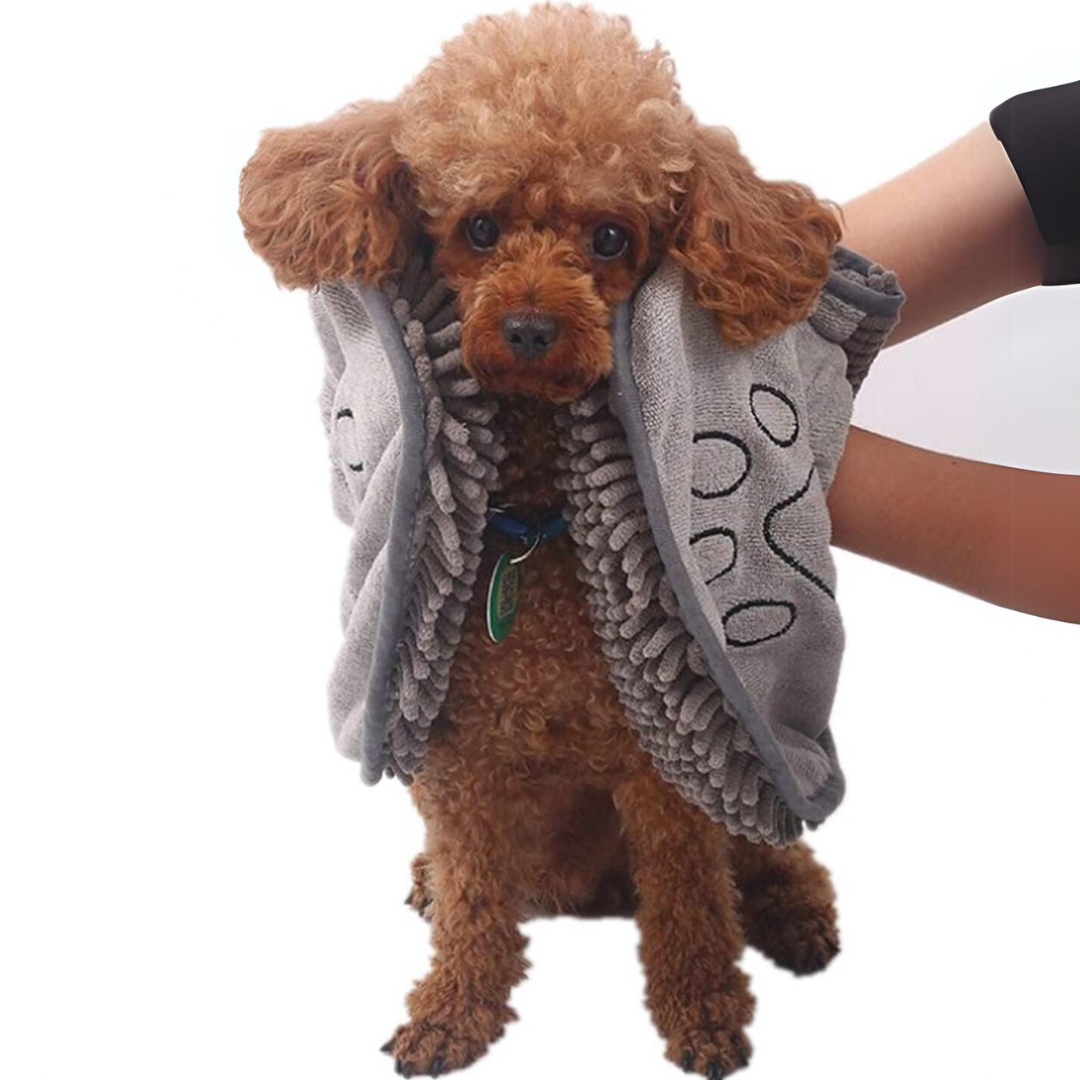 Rolled-up quick-dry microfiber dog towel, ready for use as a super absorbent pet accessory.