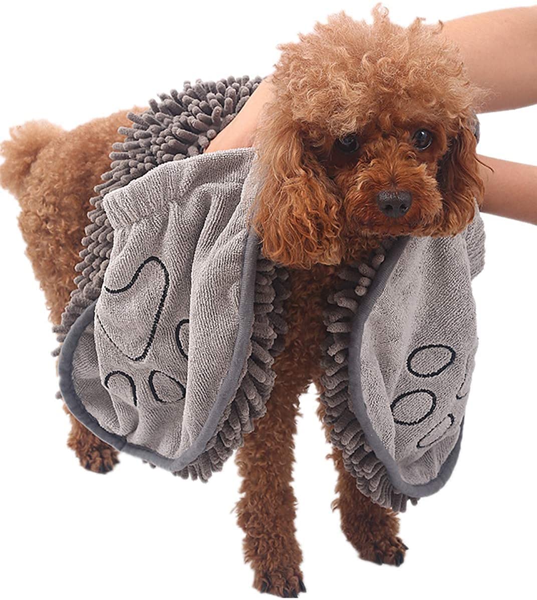 Pile of colorful microfiber dog towels, emphasizing variety and quick-dry ABSORBENCY.