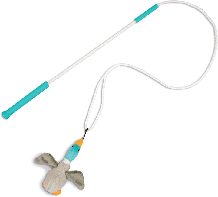 Dog playing with interactive tail teaser dog toy, promoting exercise & enrichment