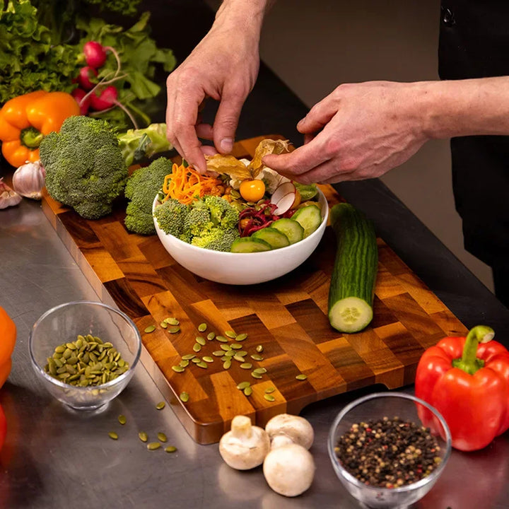 High-quality acacia wood food prep board with deep juice grooves & double-sided design for a clean, organized kitchen.