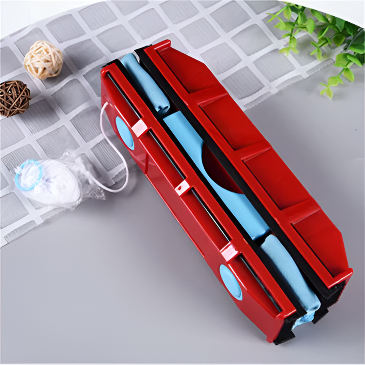 Magnetic window cleaning tool for quick and easy streak-free shine on double-pane glass. Home care solution.