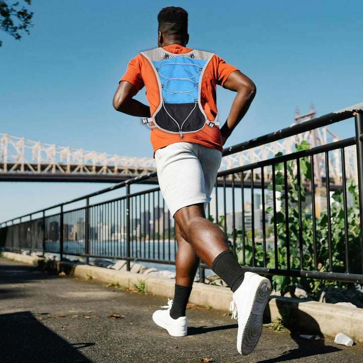 Dravien hydration vest with a sports towel in a back pocket, convenient for athletes