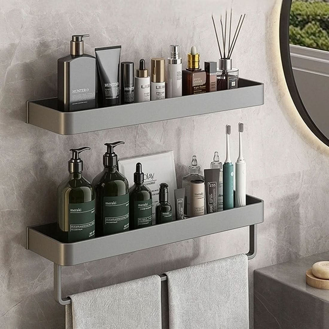 Space-saving wall organizer shelf with towel bar for bathroom toiletries & towels.