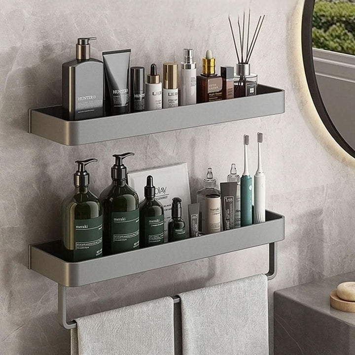 Space-saving wall organizer shelf with towel bar for bathroom toiletries & towels.