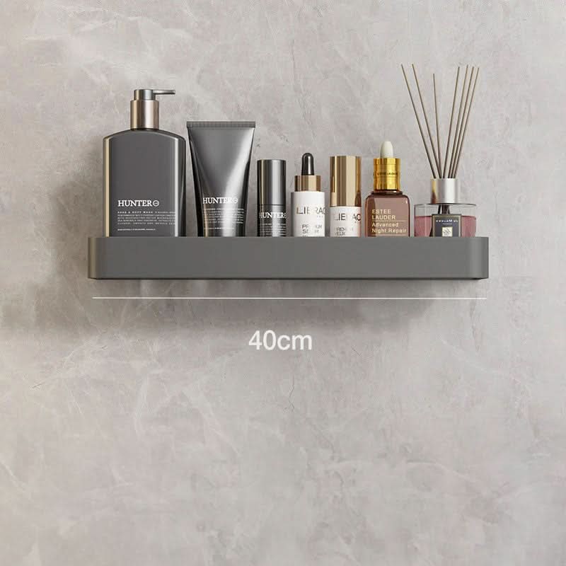 Organize your bathroom with this wall-mounted, drill-free shelf & towel bar for essentials.