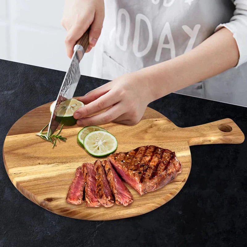 Elegant acacia wood serving board for charcuterie, bread, and fruit platters. Ideal for kitchen entertaining.