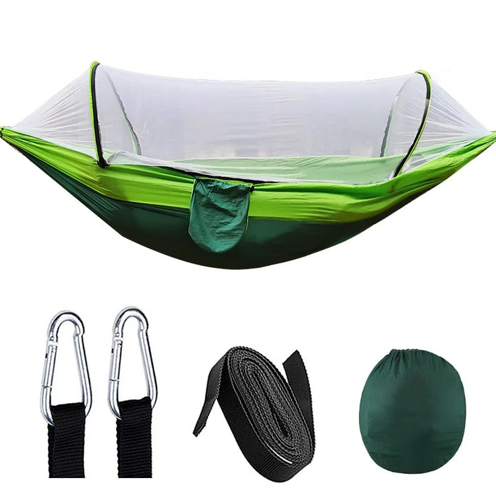 Parachute hammock with durable fabric and full mosquito net for reliable outdoor gear.