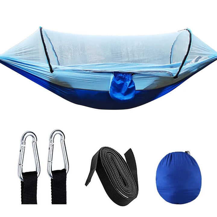 Camping hammock featuring a protective mosquito net, ideal for a bug-free outdoor experience.