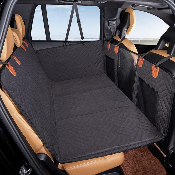 Black waterproof dog car seat cover, pet travel car protector with door shields & storage pockets.