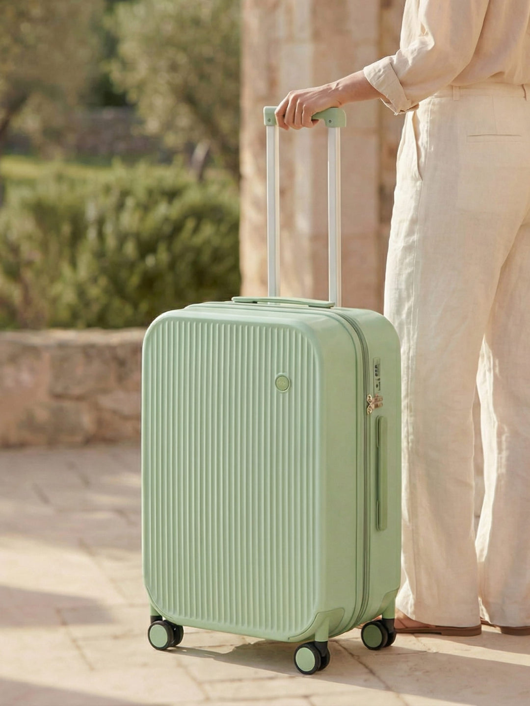 Sleek black hard-shell suitcase with smooth-gliding spinner wheels, ready for any journey.