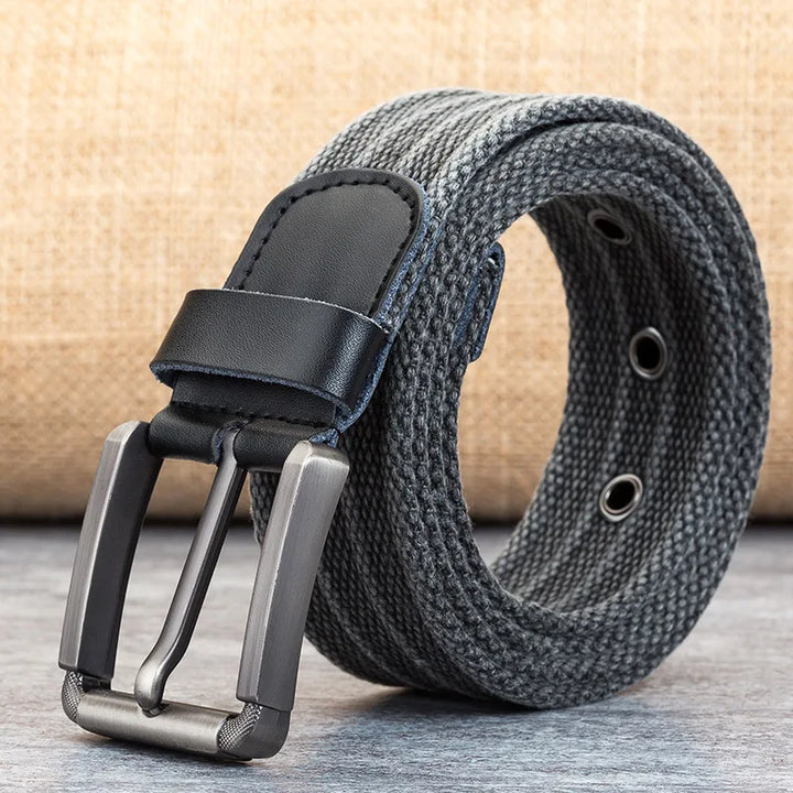 Stylish men's fashion belt, woven design with elegant leather trim & metal buckle. Versatile accessory.