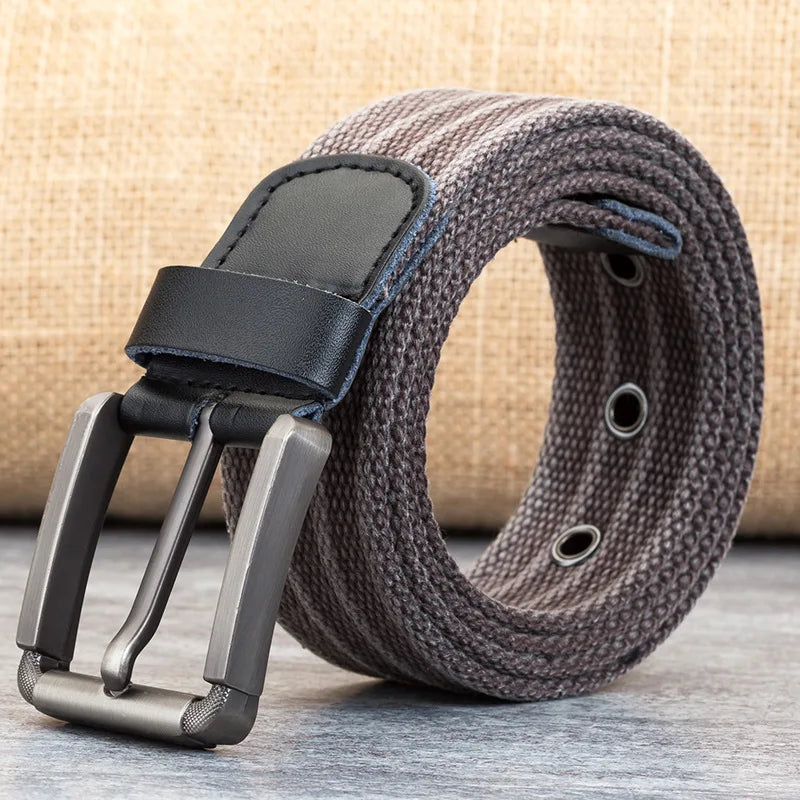 Adjustable length men's woven belt with genuine leather accents & secure buckle. Comfortable everyday wear.