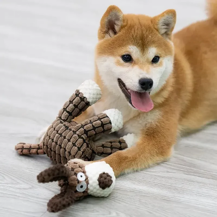 Robust plush dog chew toy, ideal for aggressive chewers, supporting dental health & satisfying strong chewing instincts.
