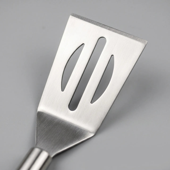 Essential stainless steel BBQ grilling tool kit, perfect for outdoor cooking, includes tongs, spatula, fork, and storage case.