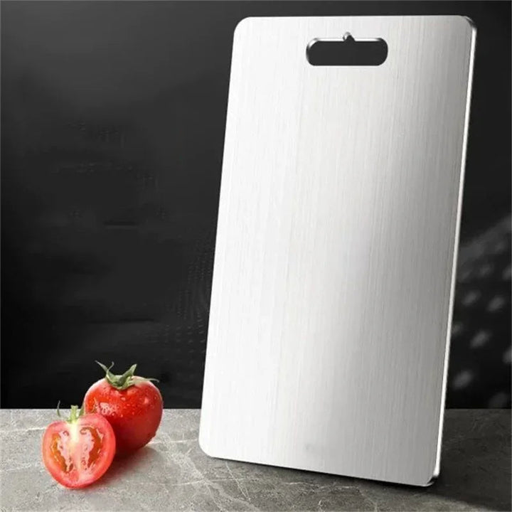 Close-up of the smooth, durable stainless steel cutting board surface for everyday kitchen use.