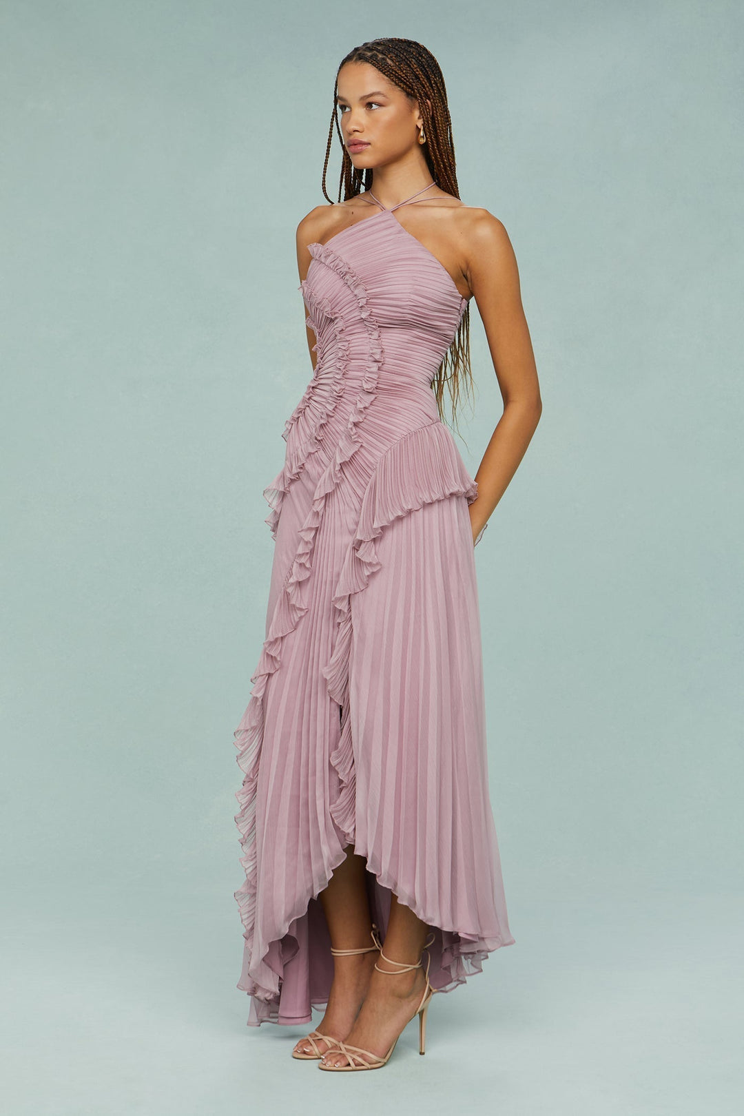 Flowy chic dusty mauve halter maxi dress with ruffles. Women's sophisticated special occasion or party wear.