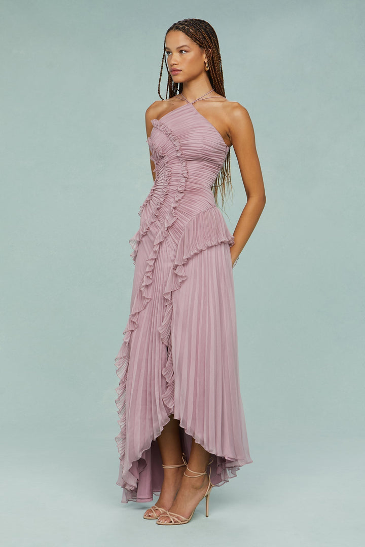 Flowy chic dusty mauve halter maxi dress with ruffles. Women's sophisticated special occasion or party wear.