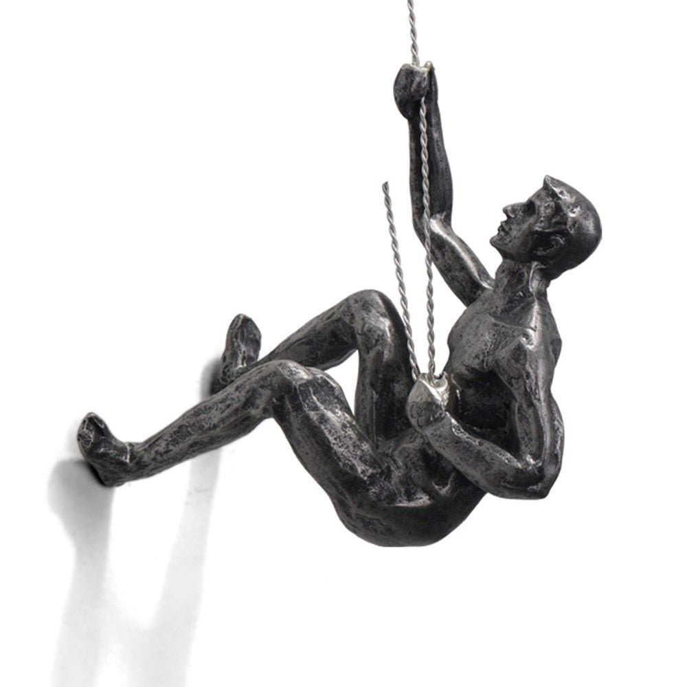 Office decoration: dynamic climbing figure wall sculpture, unique and abstract.