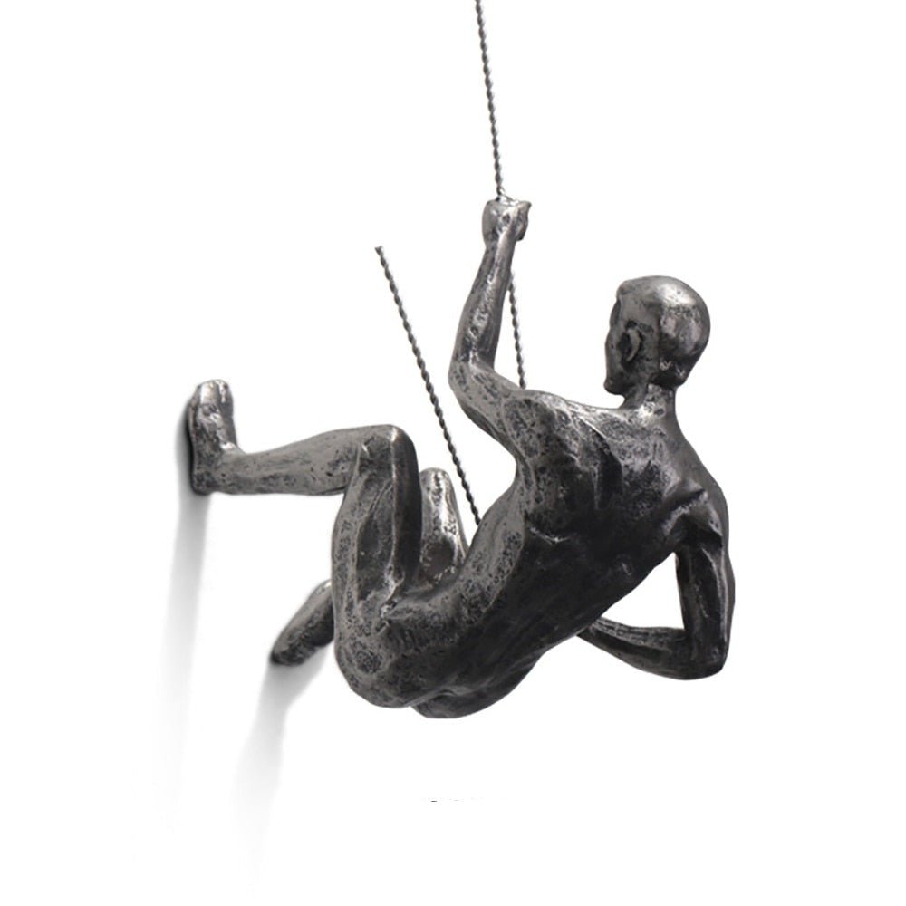 Modern home decor: handmade wall sculpture of a dynamic climber.