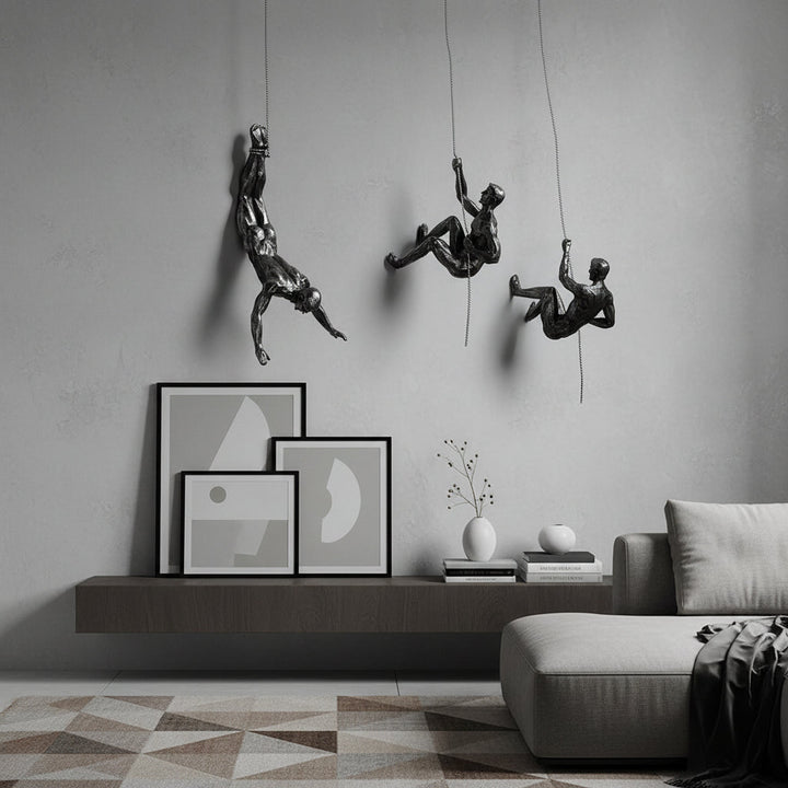 Artistic wall figure decor, a dynamic climber sculpture for modern interiors.
