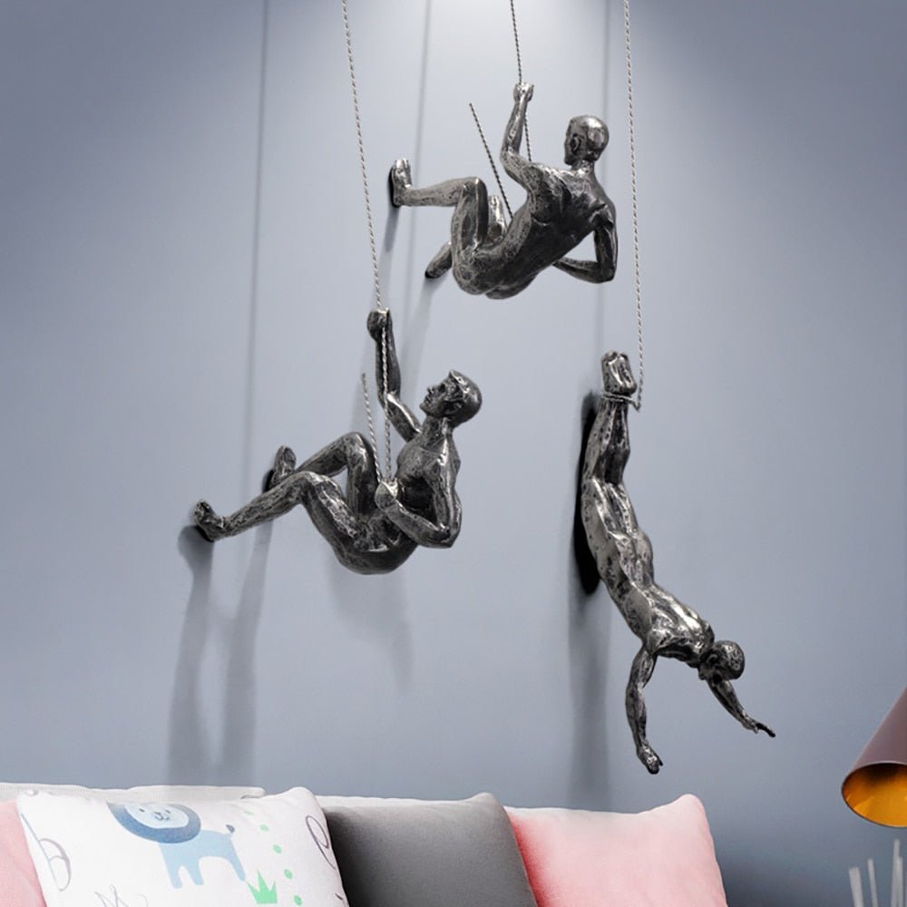 Unique abstract wall decor, a handmade dynamic climber figure.