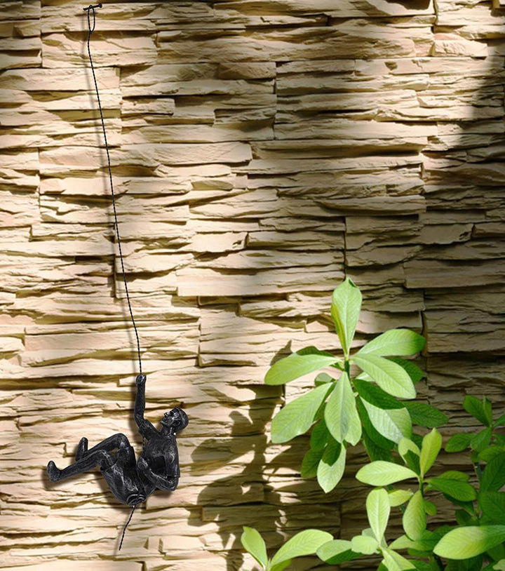 Gallery wall art: handmade dynamic climber sculpture, artistic and modern.