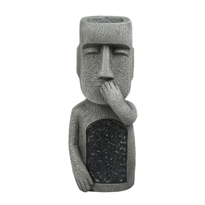 Decorative Moai head planter with LED light, ideal for indoor plants or outdoor patio decor.