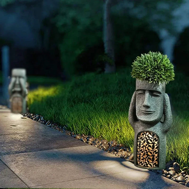 Handcrafted resin Moai statue planter featuring an LED light, perfect as a unique gift or garden ornament.