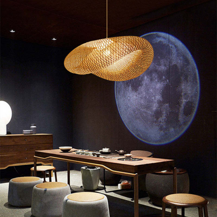 Eco-chic bamboo ball LED pendant lamp, natural decor for living room. Sustainable lighting.