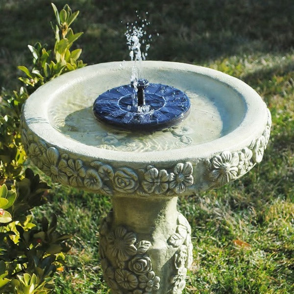 Eco-friendly solar garden fountain. Ideal outdoor water feature for ponds, birdbaths, and decor.