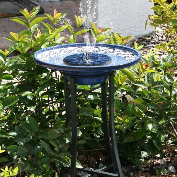 Sustainable solar-powered fountain enhancing any garden pond. An eco-friendly outdoor water feature & birdbath.