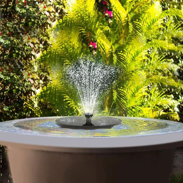 Eco-friendly solar water fountain for garden bird baths, creating a tranquil outdoor water feature.
