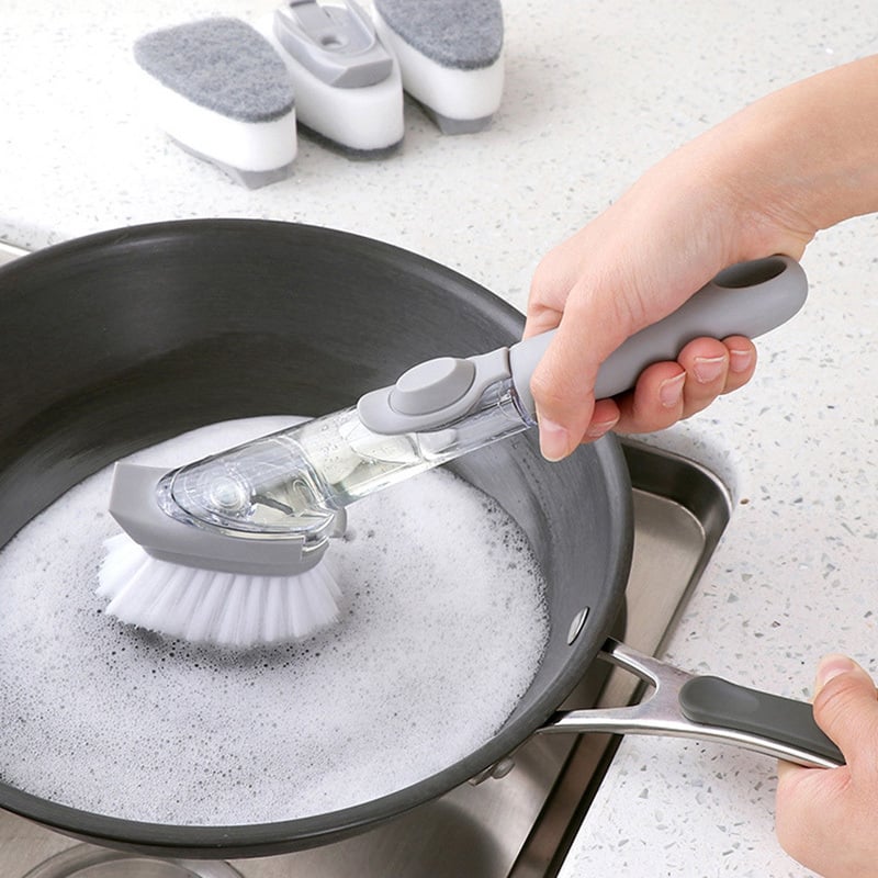Innovative dish scrubber with integrated soap dispenser, perfect for efficient kitchen cleanup.