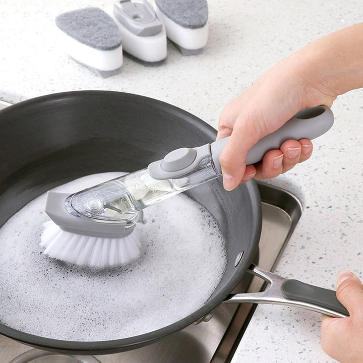 Innovative dish scrubber with integrated soap dispenser, perfect for efficient kitchen cleanup.
