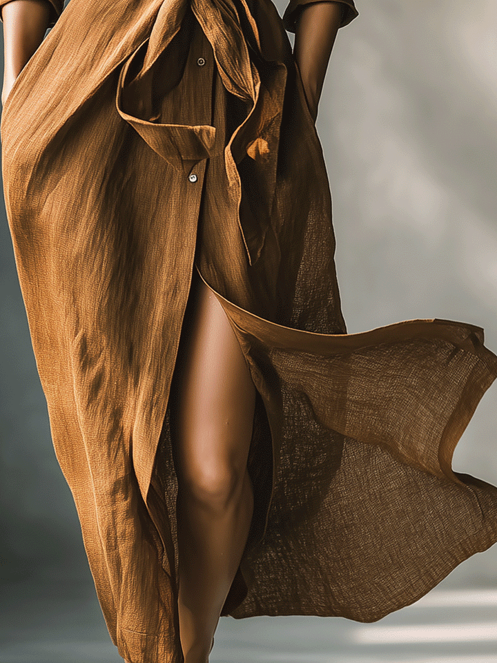 Chic brown V-neck shirt dress for women, a maxi length with long sleeves and tie waist, suited for autumn fashion.