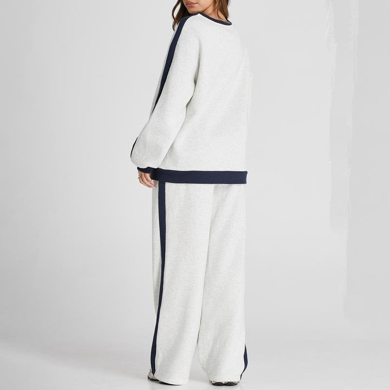 Soft women's matching lounge set, a comfortable two-piece with relaxed fit for chic casual wear.