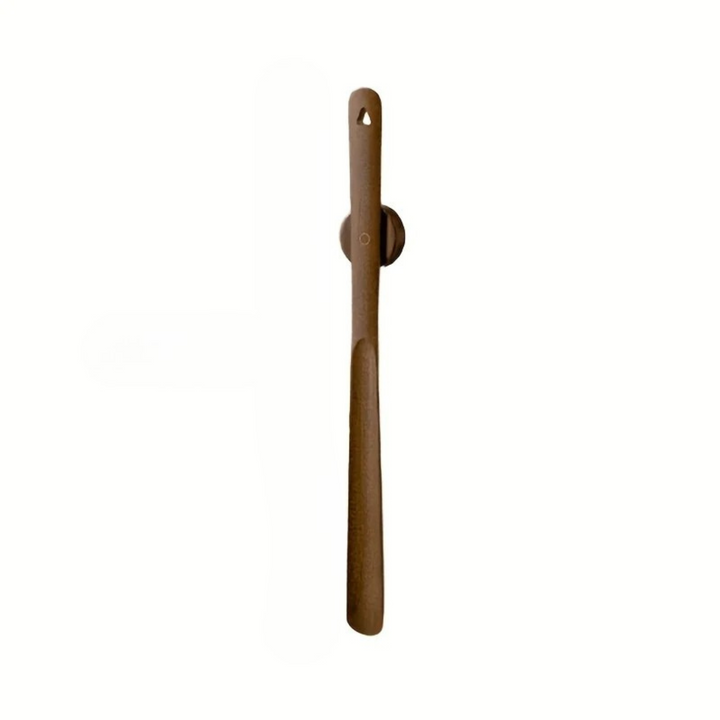 Elegant magnetic wood shoehorn. This long beechwood shoe accessory ensures easy on/off & chic wall storage.